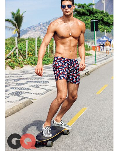 Man in swim shorts after full body waxing