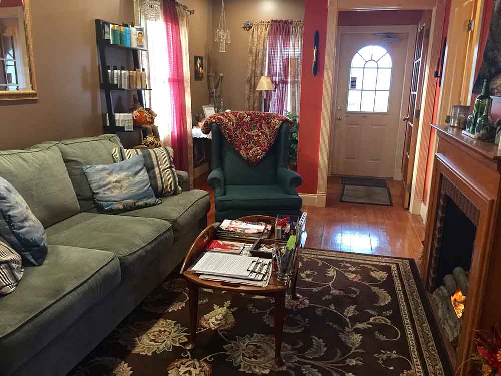 Reception lounge with sofa and armchair
